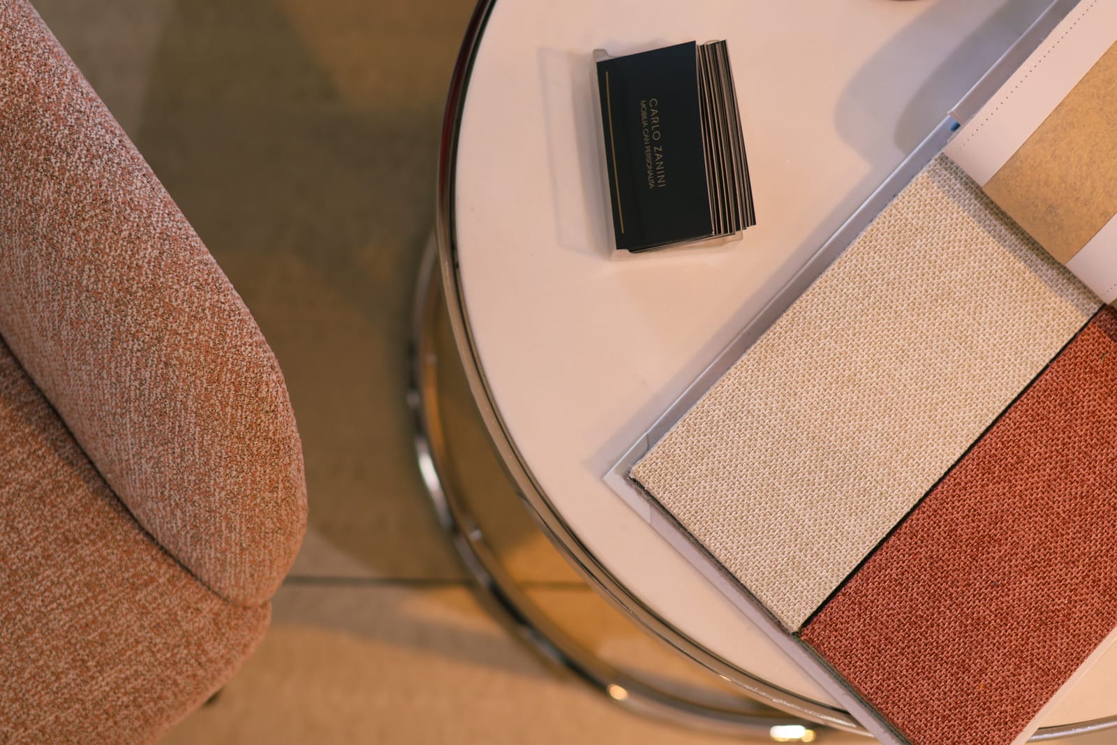Fabric shade samples laid out on a table.